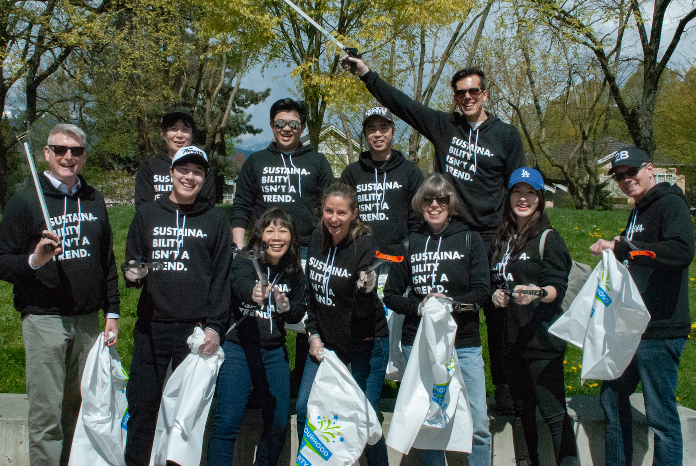 The Genus Capital Management team at a park cleanup for a B Local Vancouver event.