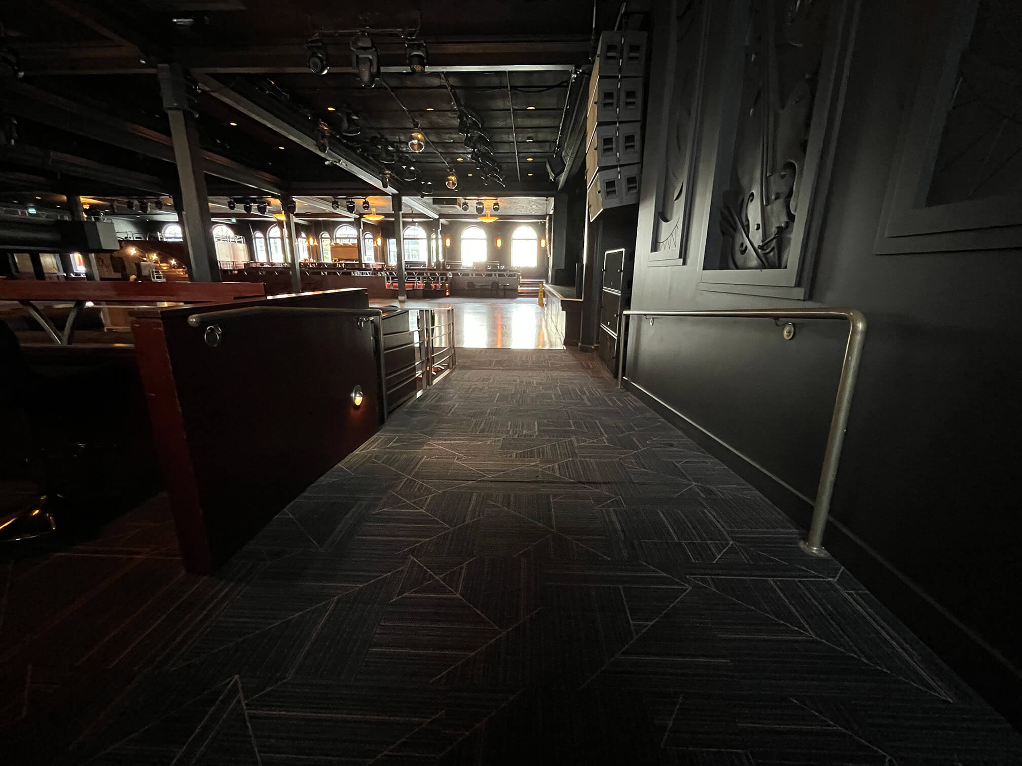 View of the access ramp at the Commodore Ballroom’s seating area, looking down-slope.