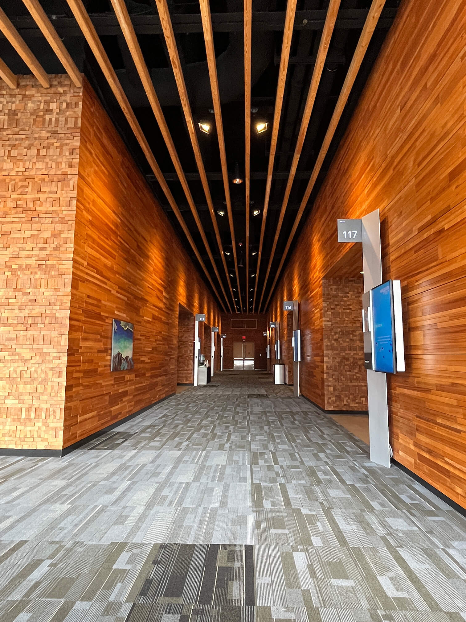 One of the inner hallways to conference rooms, which may be darker than the main corridors.