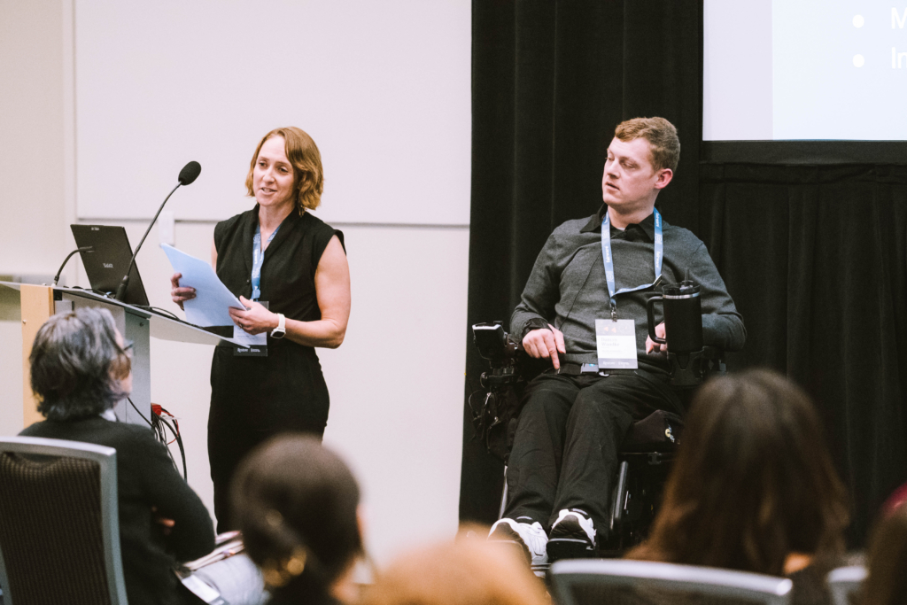 Maiya Holliday of Mangrove, left, and Daman Wandke of Wandke Accessibility discuss digital accessibility strategies during a Champions Retreat 2024 session.